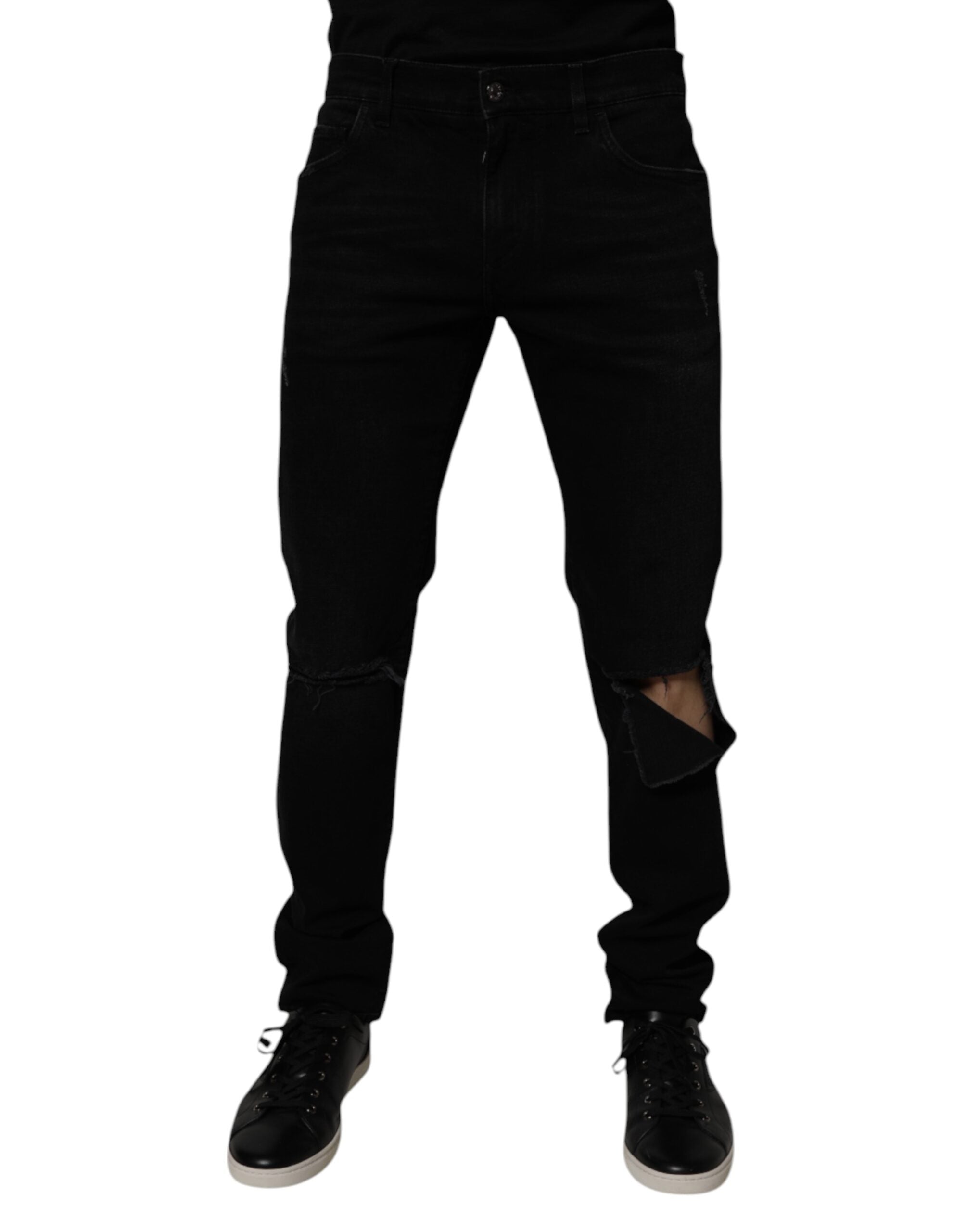 Jeans homme skinny en coton noir déchiré de Dolce & Gabbana, style décontracté avec usures et détails tendance.