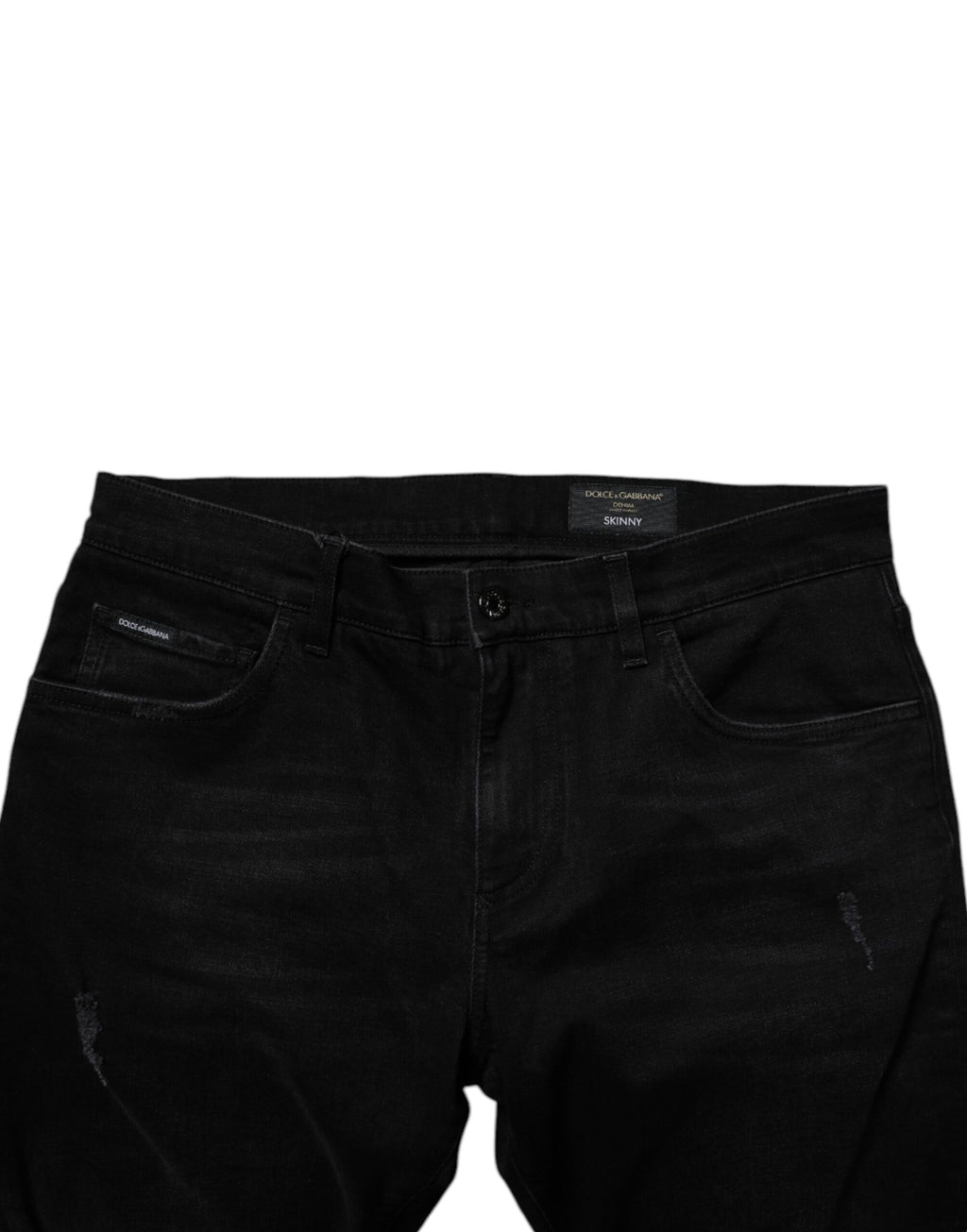Jeans slim en denim noir tissé à la main de Dolce & Gabbana pour homme, coupe skinny avec détails déchirés.