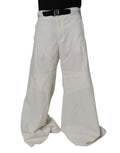 Pantalons blancs Dolce & Gabbana taille moyenne, coupe large, en tissu fluide, portée décontractée ou élégante.