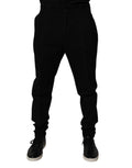 Pantalon skinny en coton stretch noir de Dolce & Gabbana, coupe ajustée et élégante, visible en gros plan.