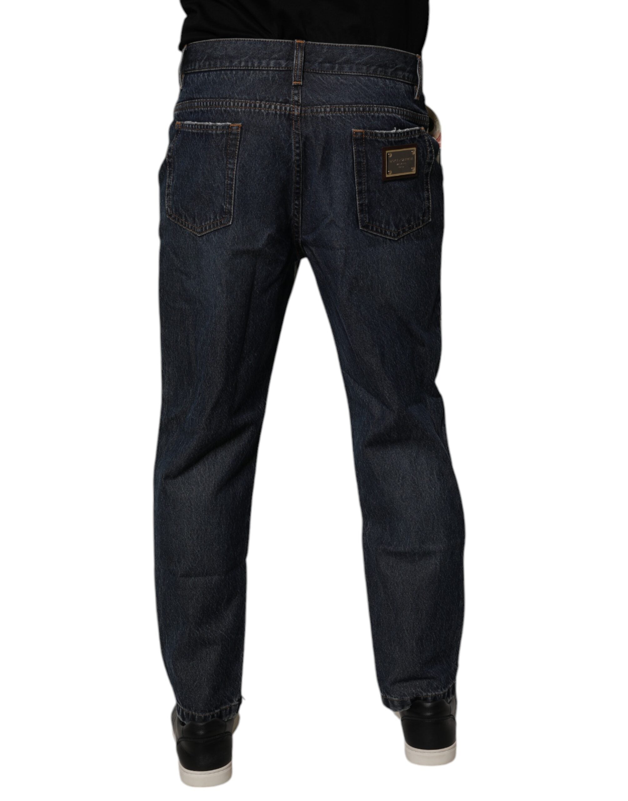Jean homme en denim beige et bleu avec motif floral en coton Dolce & Gabbana, style élégant et décontracté.