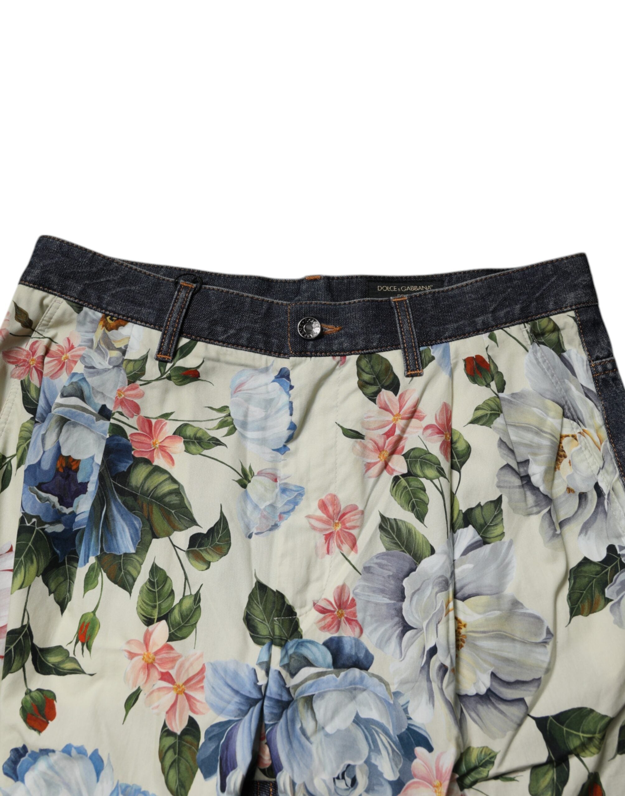 Jean homme en denim beige et bleu à motif floral en coton de Dolce & Gabbana, style élégant et décontracté.