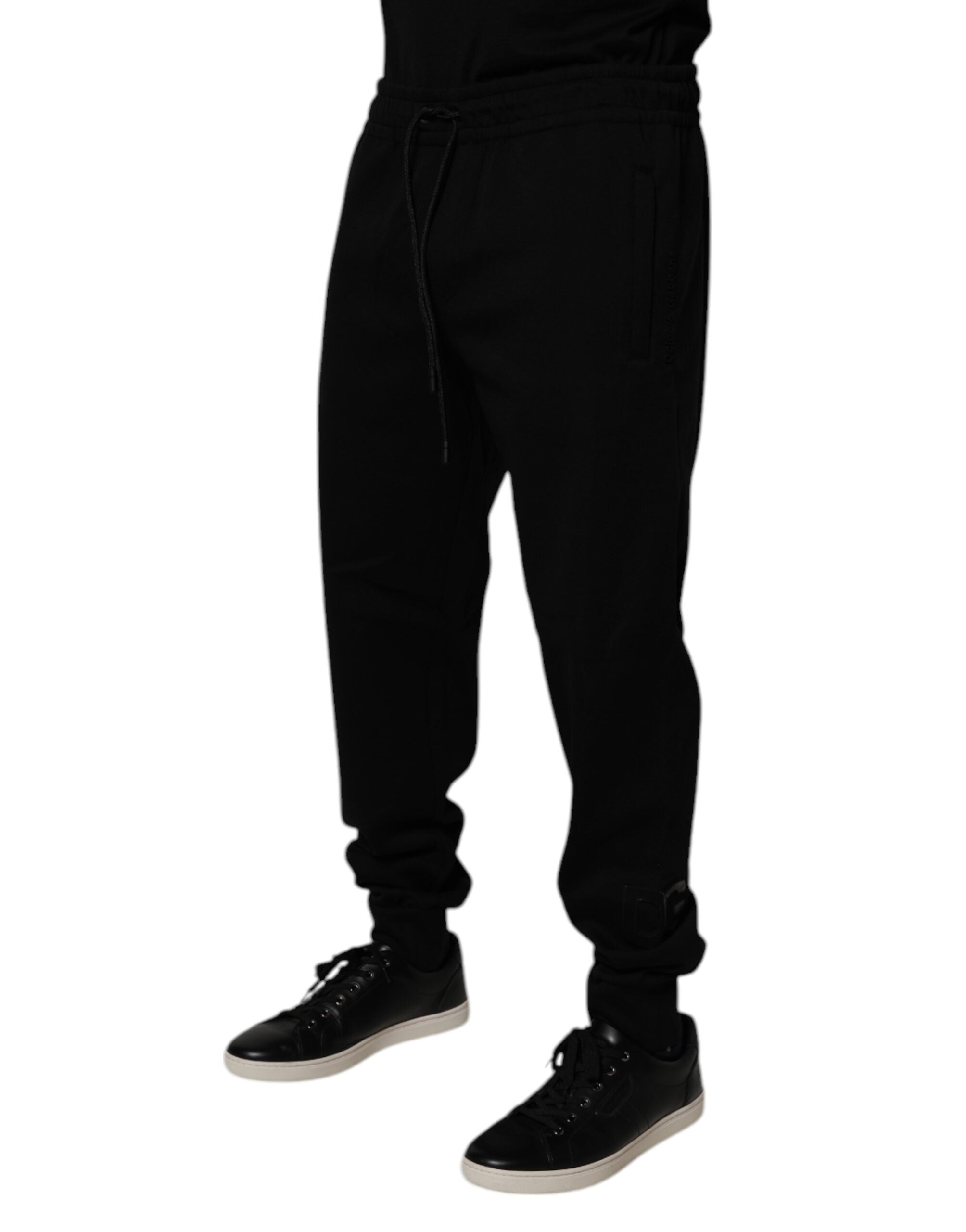 Pantalon jogger Dolce & Gabbana en coton mélangé noir, style décontracté avec ceinture élastique et poches latérales.