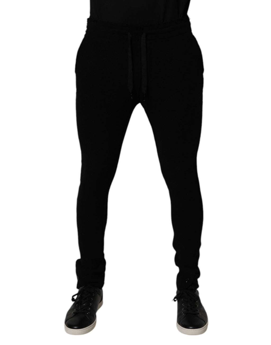 Pantalons de jogging en cachemire noir Dolce & Gabbana pour homme, sweatpants confortables avec logo discret.
