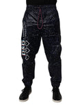 Pantalons jogger en coton bleu foncé avec motif DG Game de Dolce & Gabbana, style décontracté et tendance.