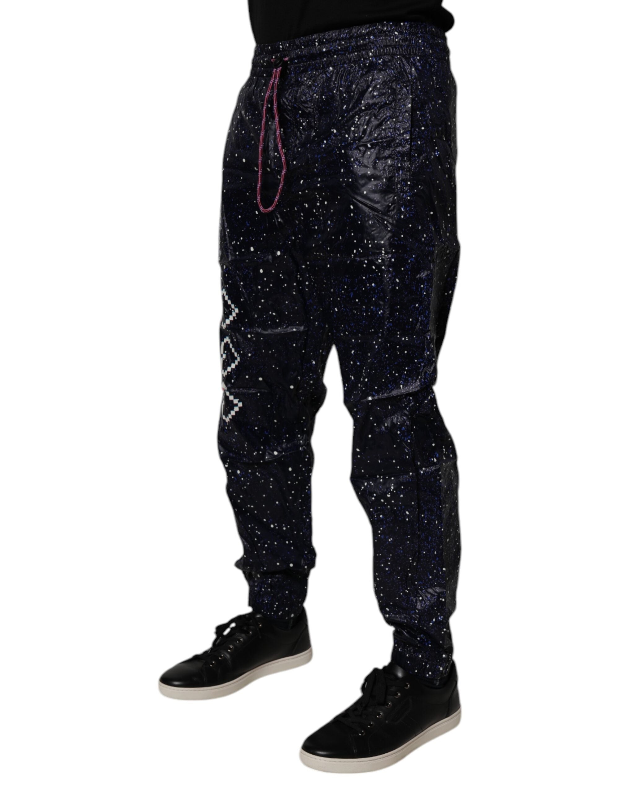 Pantalons jogger en coton bleu foncé avec motif DG Game de Dolce & Gabbana, style décontracté et moderne.