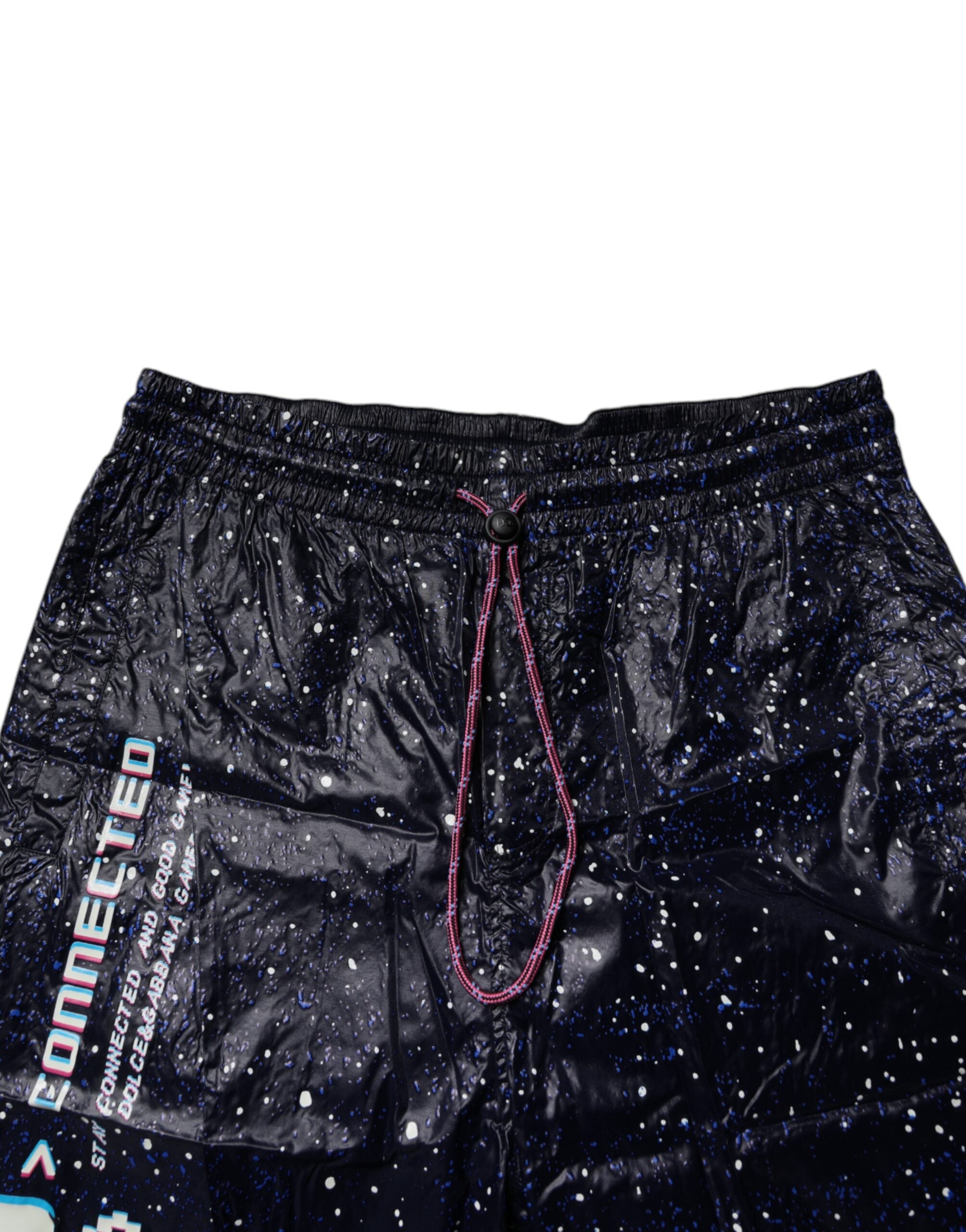 Pantalon jogger en coton bleu foncé avec imprimé DG Game de Dolce & Gabbana, style décontracté et moderne.