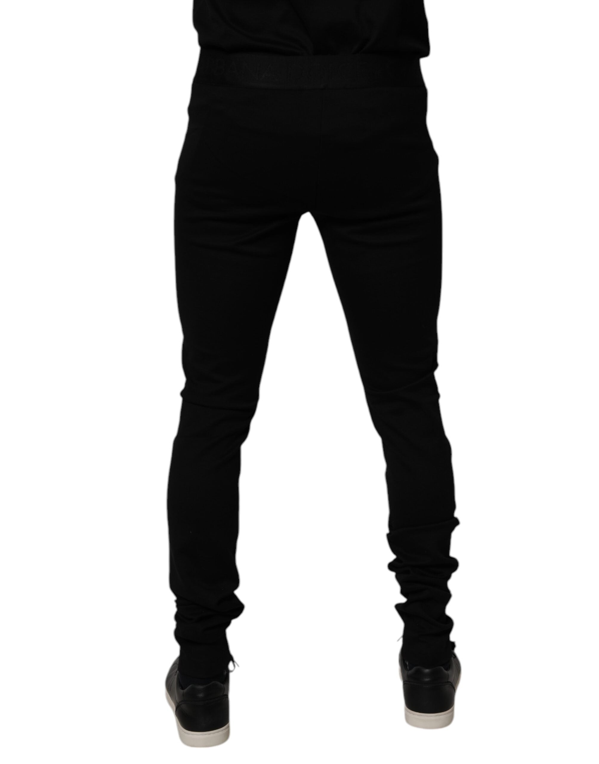 Pantalon de jogging noir en coton pour homme de Dolce & Gabbana, pantalon décontracté avec ceinture élastique et poches.