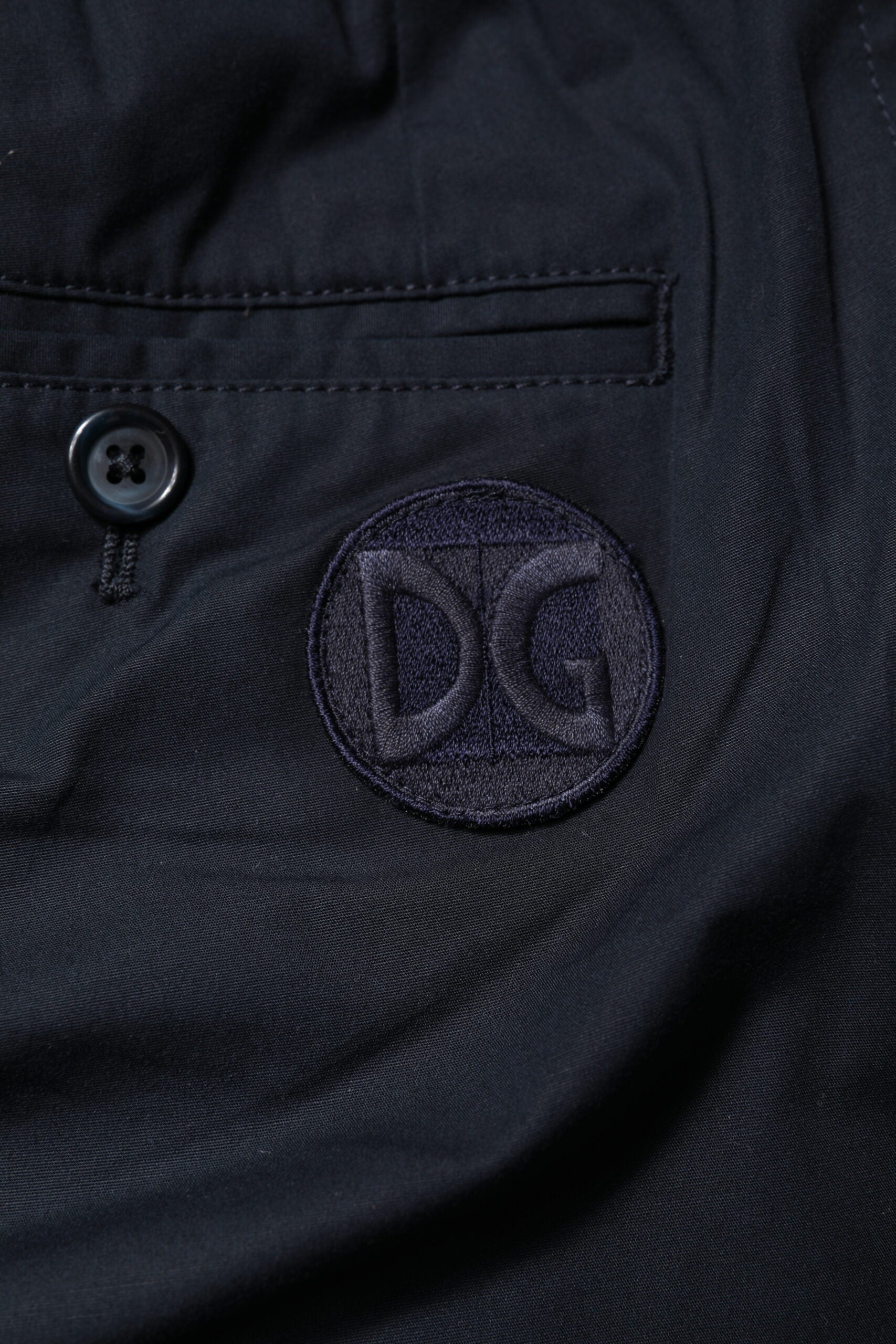 Shorts bermuda en coton bleu foncé de Dolce & Gabbana, sweatshorts décontractés avec logo discret, pour un style élégant et confortable.