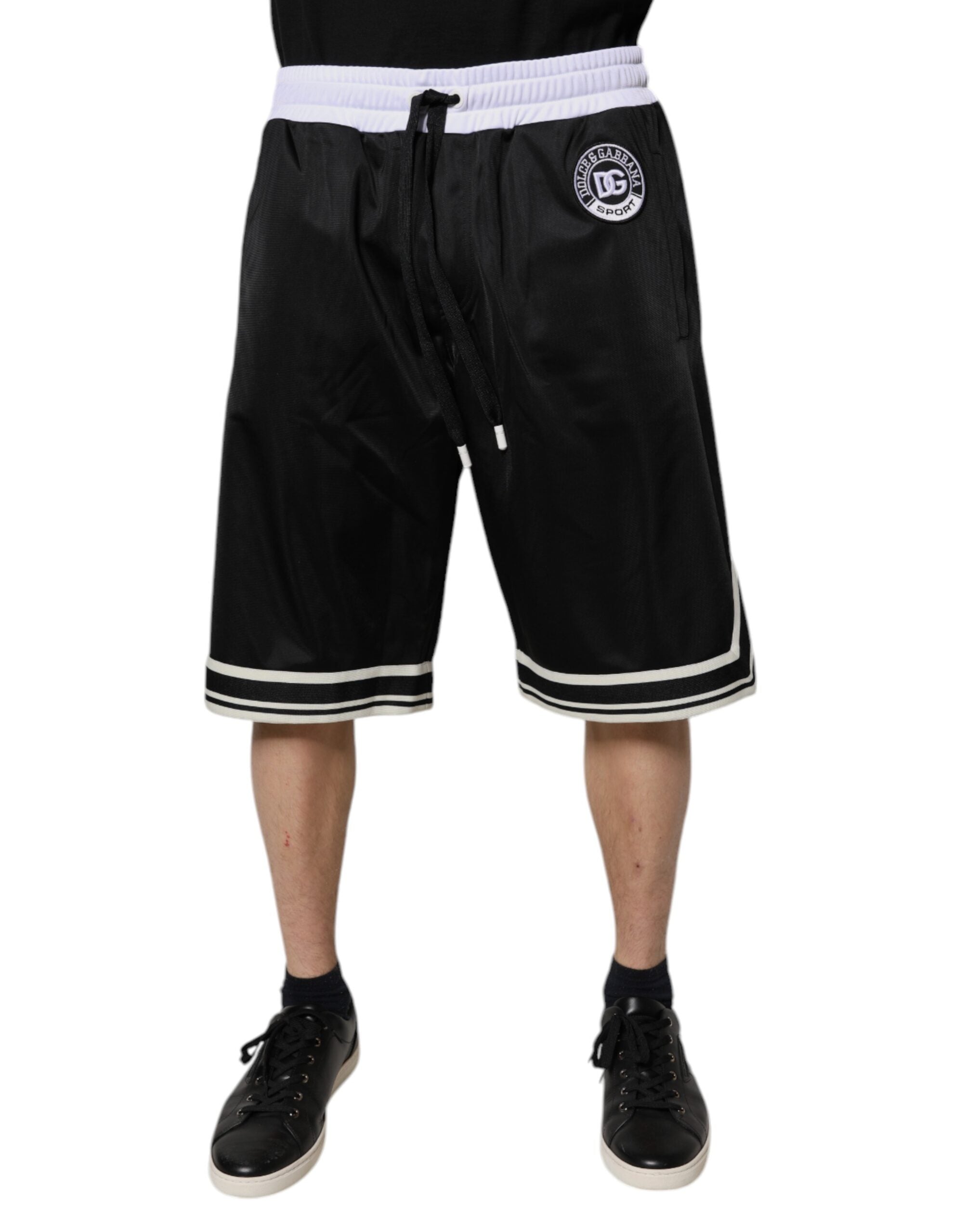 Shorts bermuda homme Dolce & Gabbana en noir et blanc, sweatshorts décontractés avec logo sur la jambe.