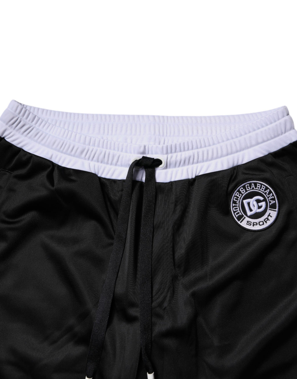 Shorts bermuda pour homme Dolce & Gabbana en noir et blanc, sweatshorts décontractés avec logo de marque visible.