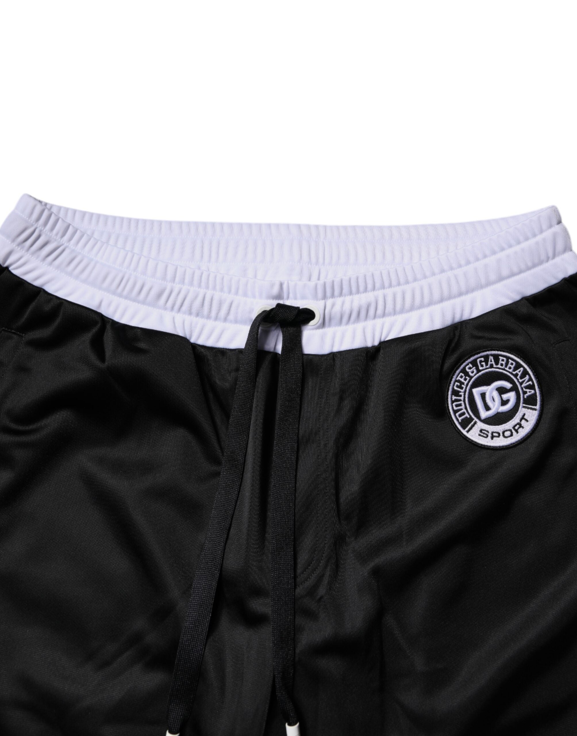 Shorts bermuda pour homme Dolce & Gabbana en noir et blanc, sweatshorts décontractés avec logo de marque visible.