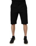 Shorts bermuda noirs en coton stretch à taille mi-fesse de Dolce & Gabbana, coupe élégante et confortable.