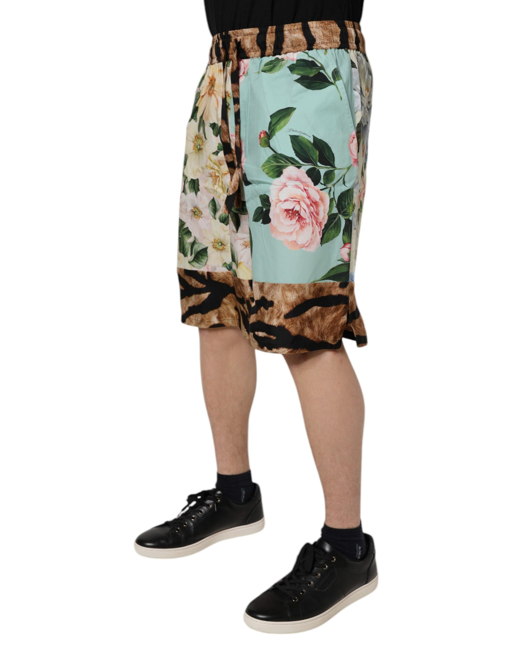 Shorts bermuda pour homme Dolce & Gabbana à motif floral multicolore, tissu léger et style élégant.