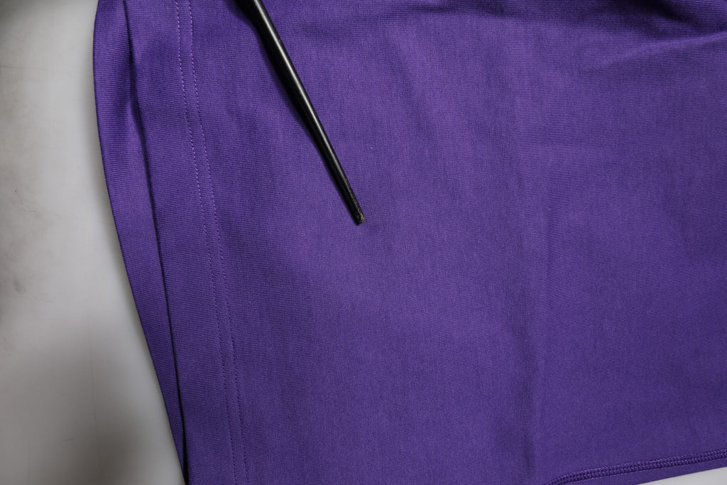 Shorts bermuda pour homme Dolce & Gabbana en coton violet, style décontracté et confortable.