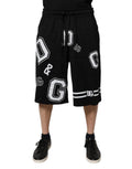 Shorts bermuda en coton noir Dolce & Gabbana avec logo, vue de face, décontractés et confortables.