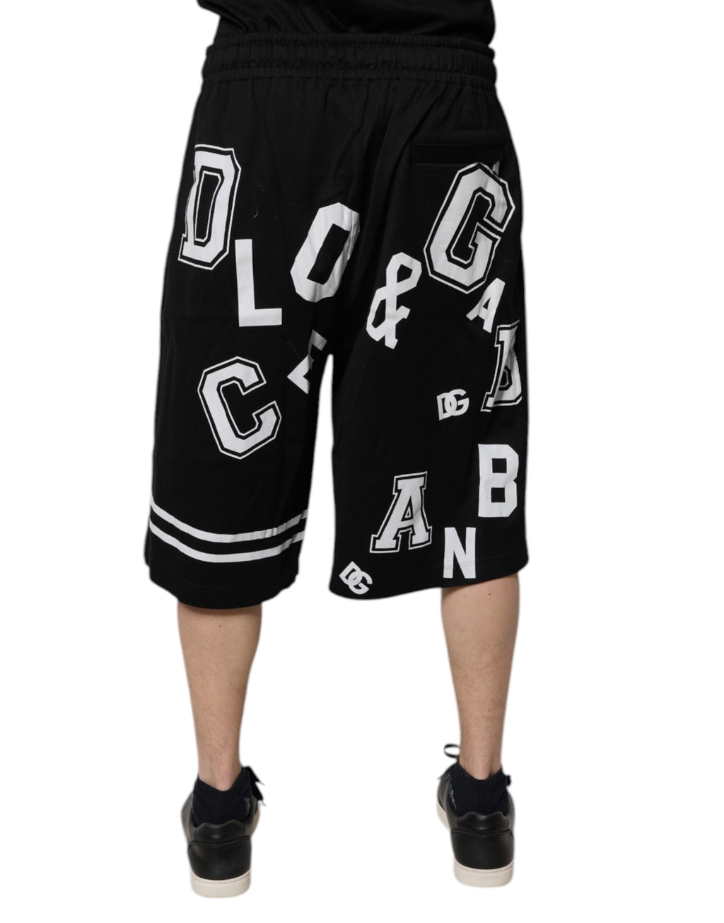 Shorts bermuda en coton noir Dolce & Gabbana avec logo, style décontracté et confortable, visible avec poches et finition soignée.