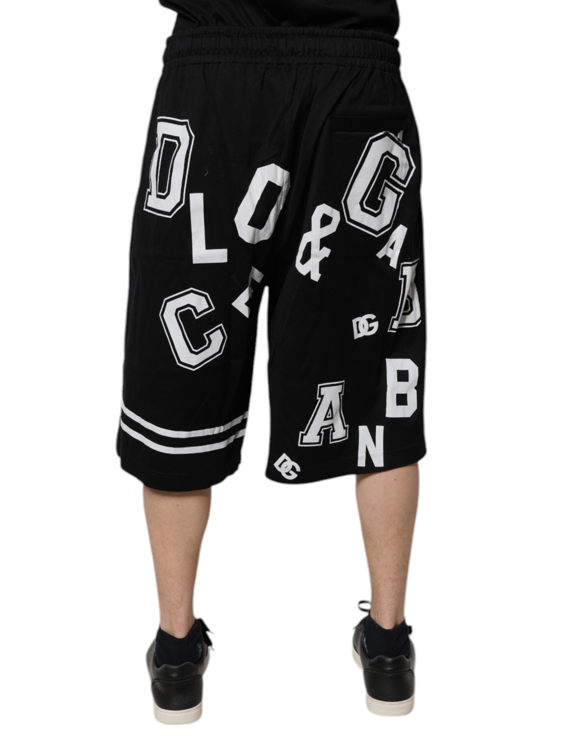 Shorts bermuda en coton noir Dolce & Gabbana avec logo, style décontracté et confortable, visible avec poches et finition soignée.