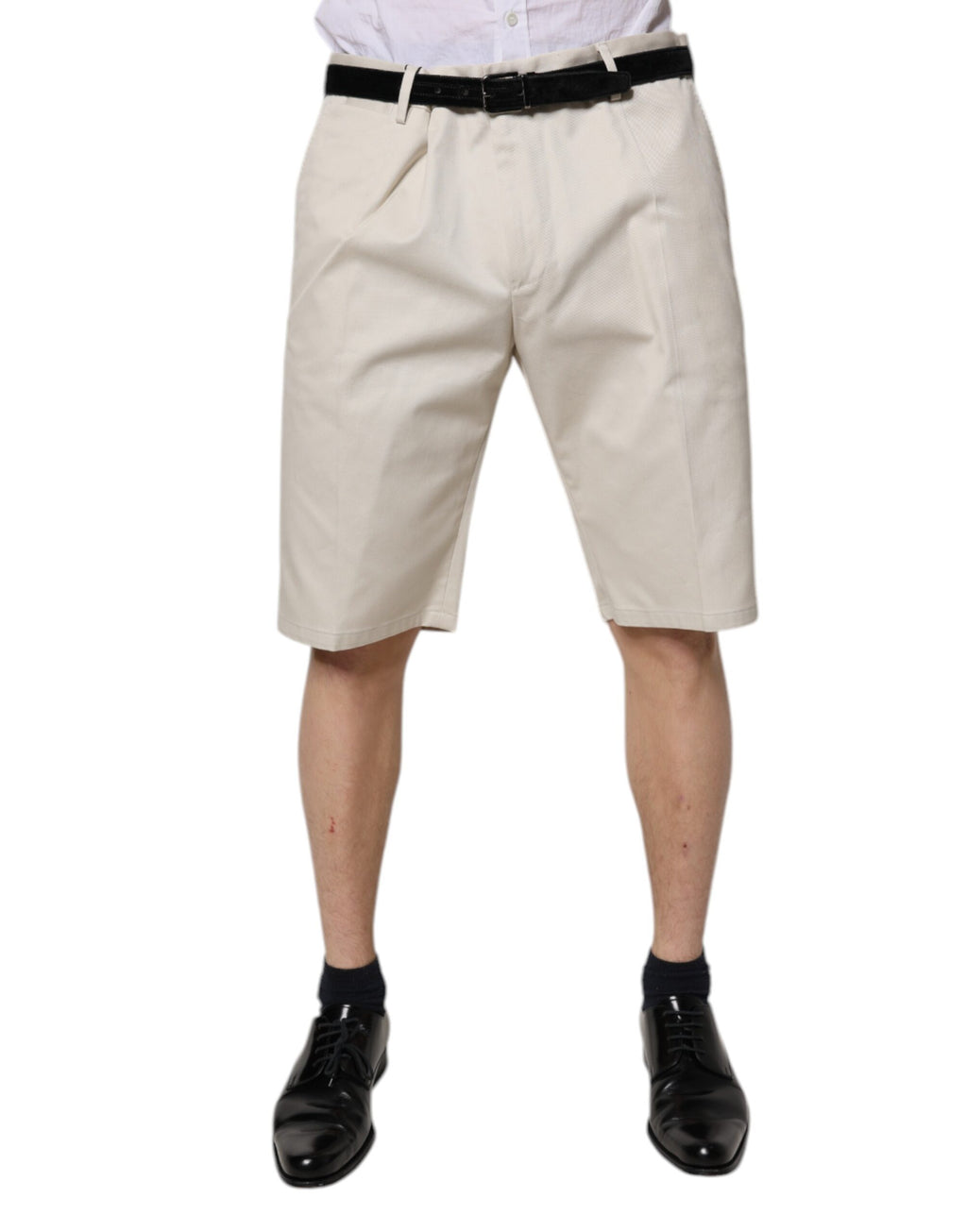 Shorts bermuda en coton beige Dolce & Gabbana, mi-hauteur, stretch, style décontracté, visible en détail sur l'image.