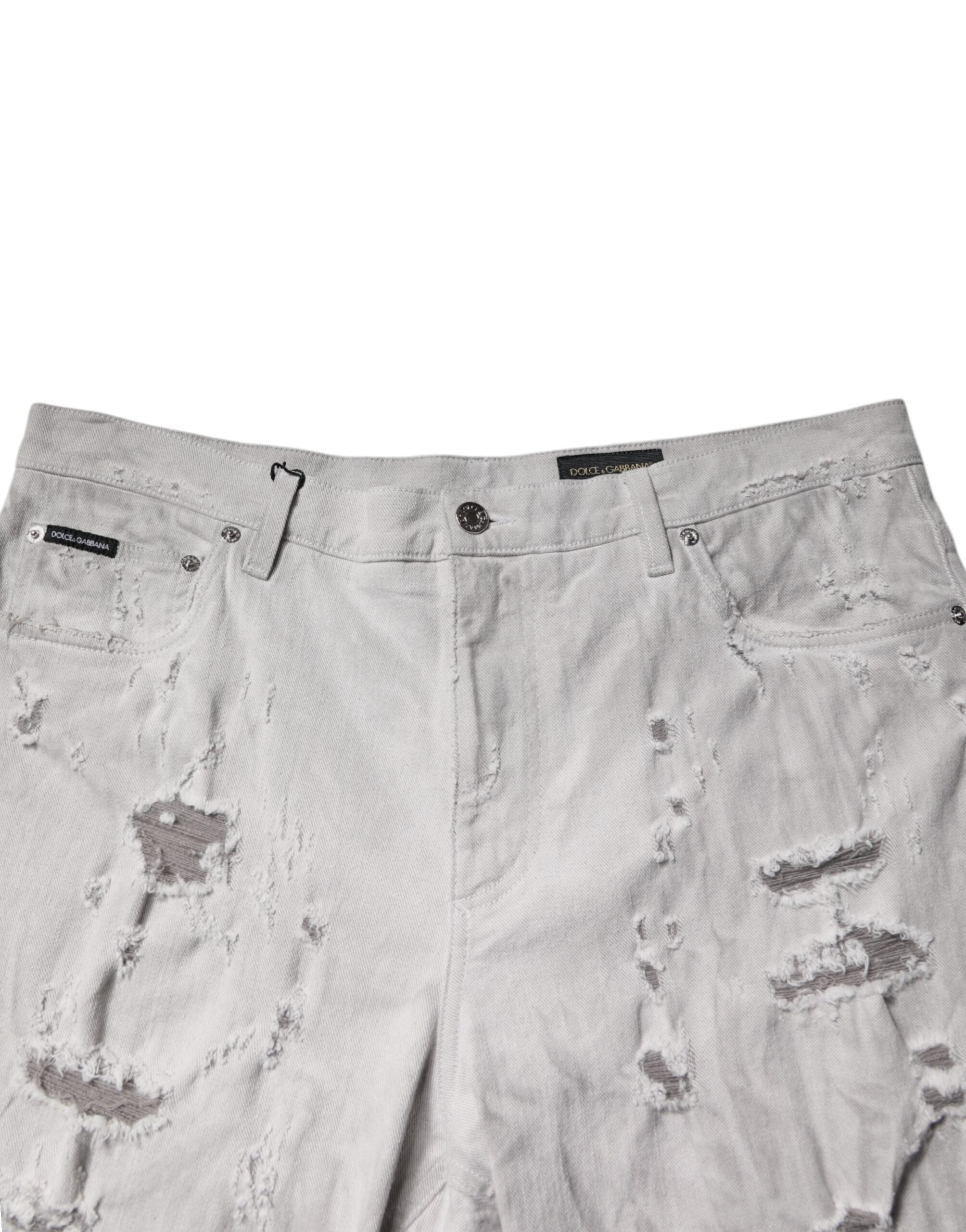 Shorts bermuda en jean déchiquetés gris clair de Dolce & Gabbana pour homme, denim avec détails usés et style décontracté.