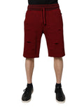 Shorts bermuda homme Dolce & Gabbana en coton bordeaux, avec logo et coupe décontractée, sur un fond neutre