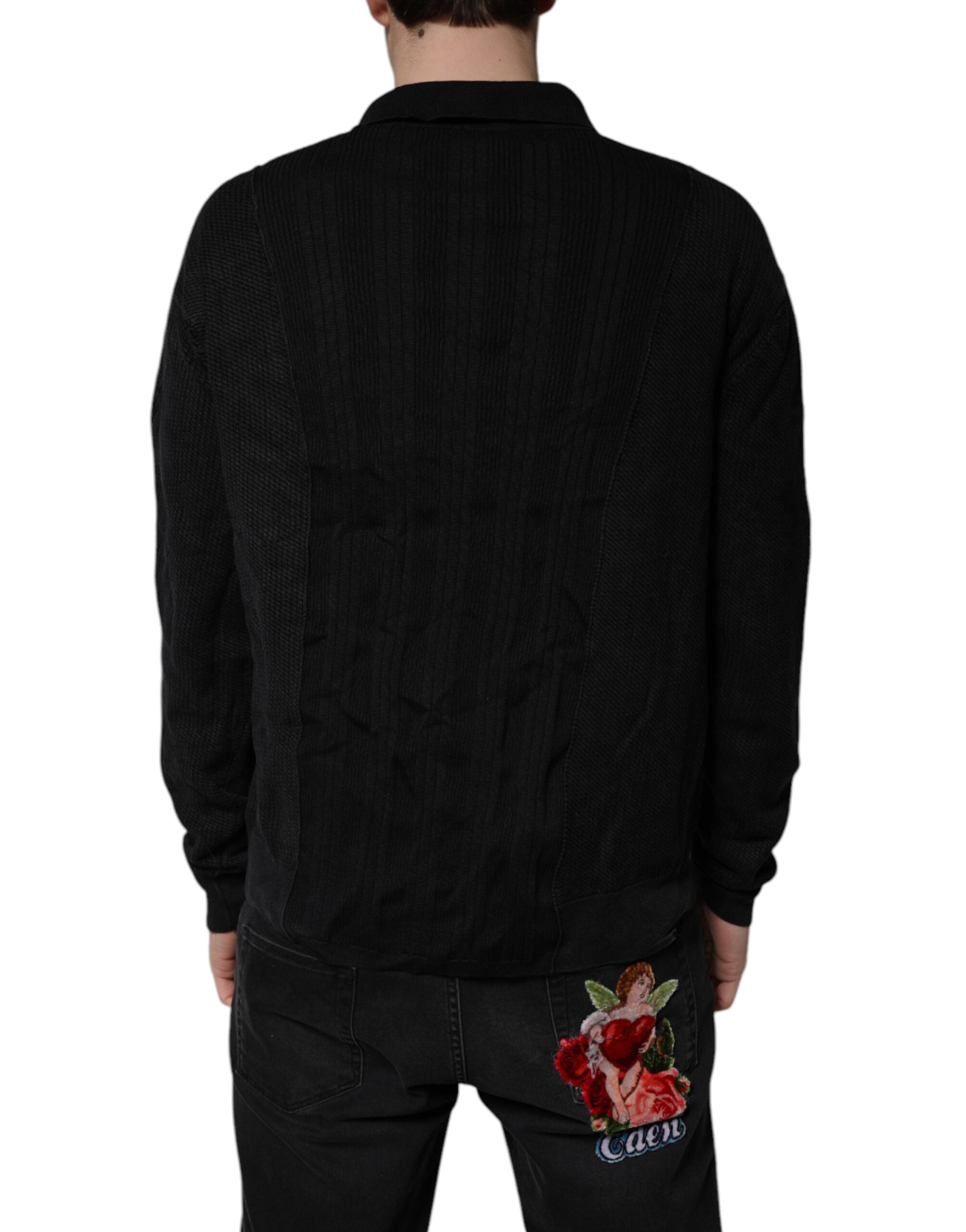 Pull à manches longues Dolce & Gabbana en soie noire avec motif héraldique et boutons, élégant et sophistiqué.