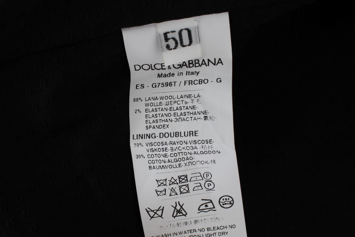 Gilet formel gris à rayures Dolce & Gabbana, élégant, ajusté, avec col en V et fermeture à boutons.