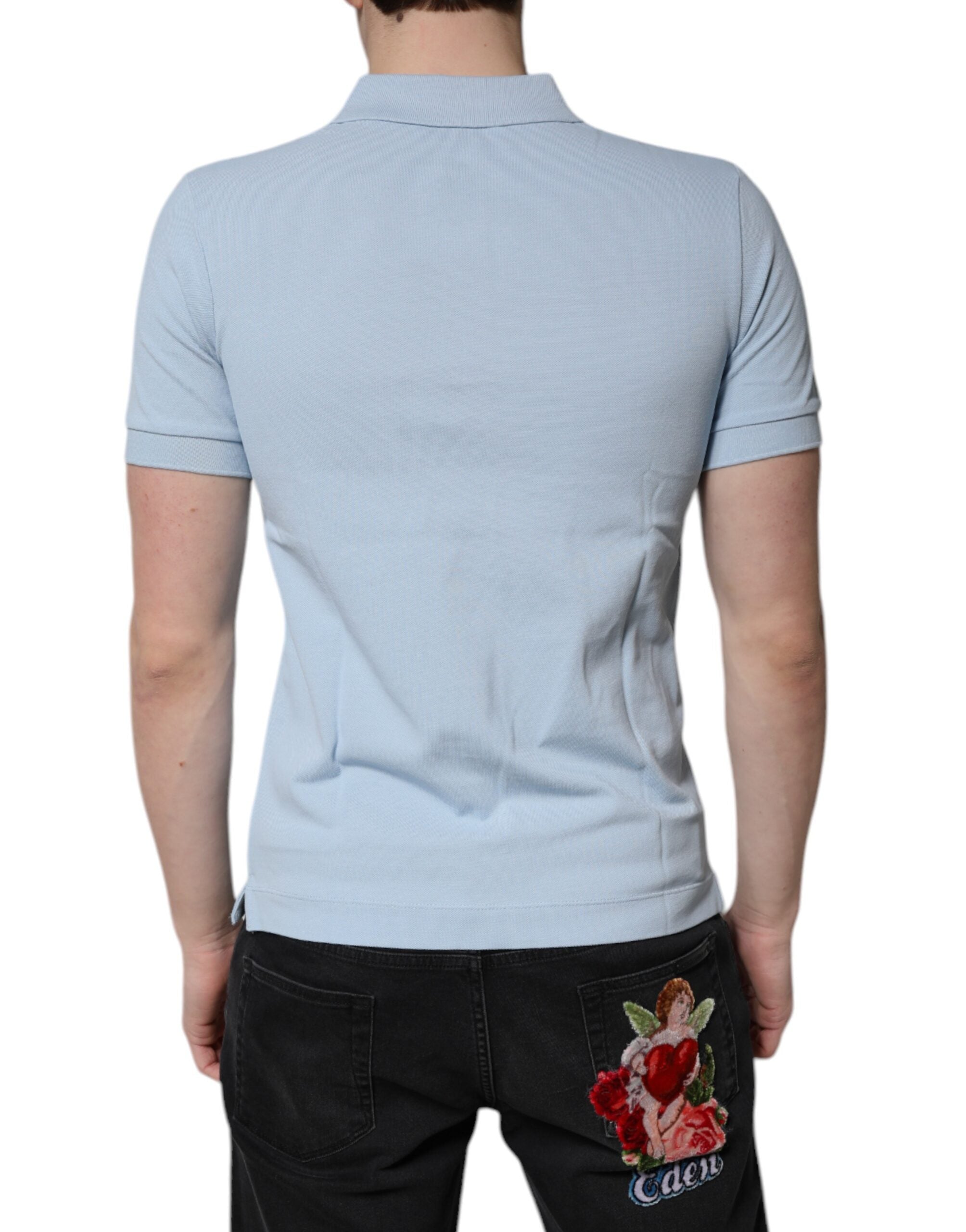 Polo blanc en coton Dolce & Gabbana Sky Blue avec col à couronne, détail élégant et logo discret, vue de face.