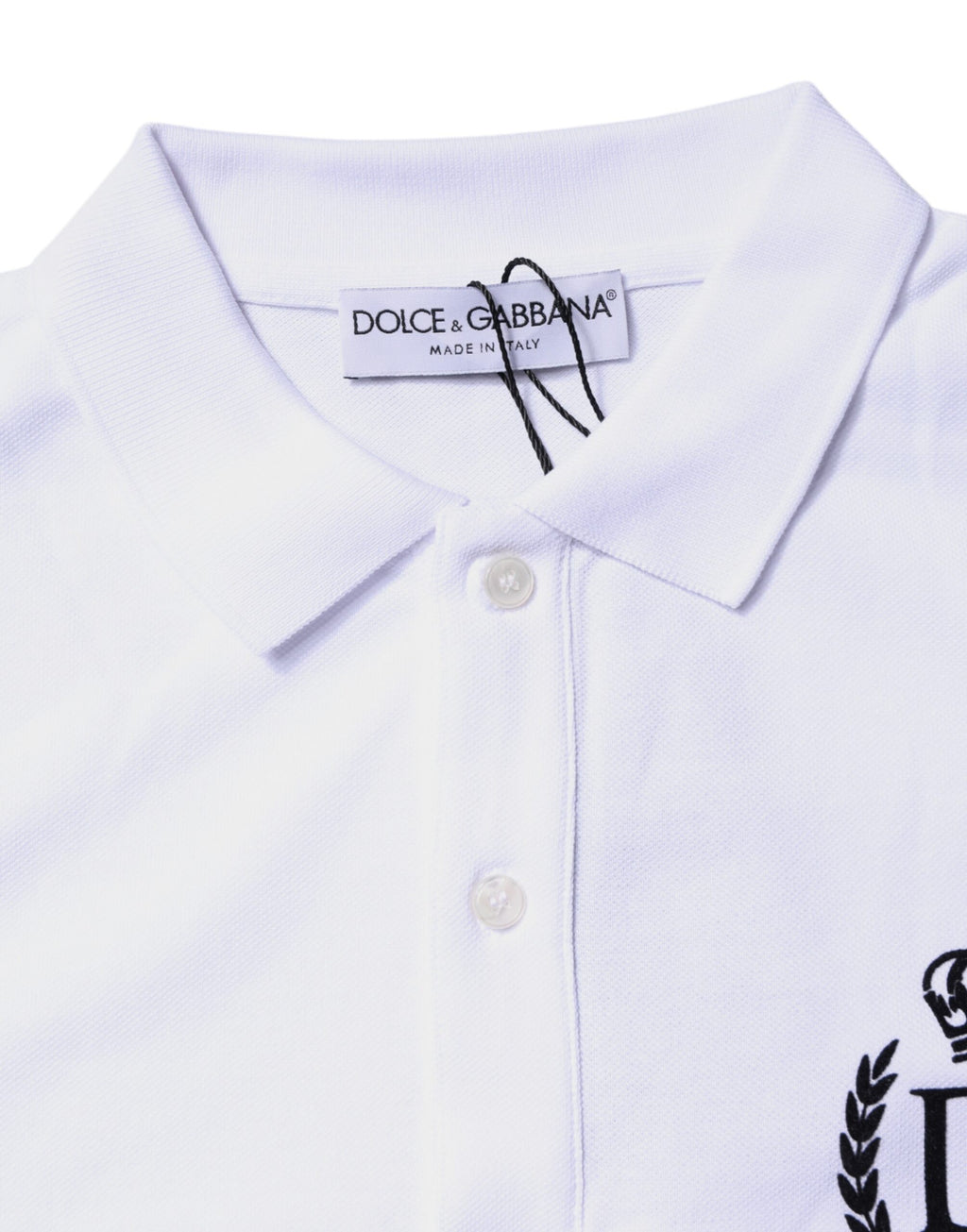 Polo homme Dolce & Gabbana blanc en coton avec col à couronne, style élégant et classique.