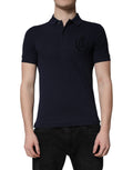 Polo Dolce & Gabbana en coton bleu foncé avec col en forme de couronne, style élégant et décontracté.
