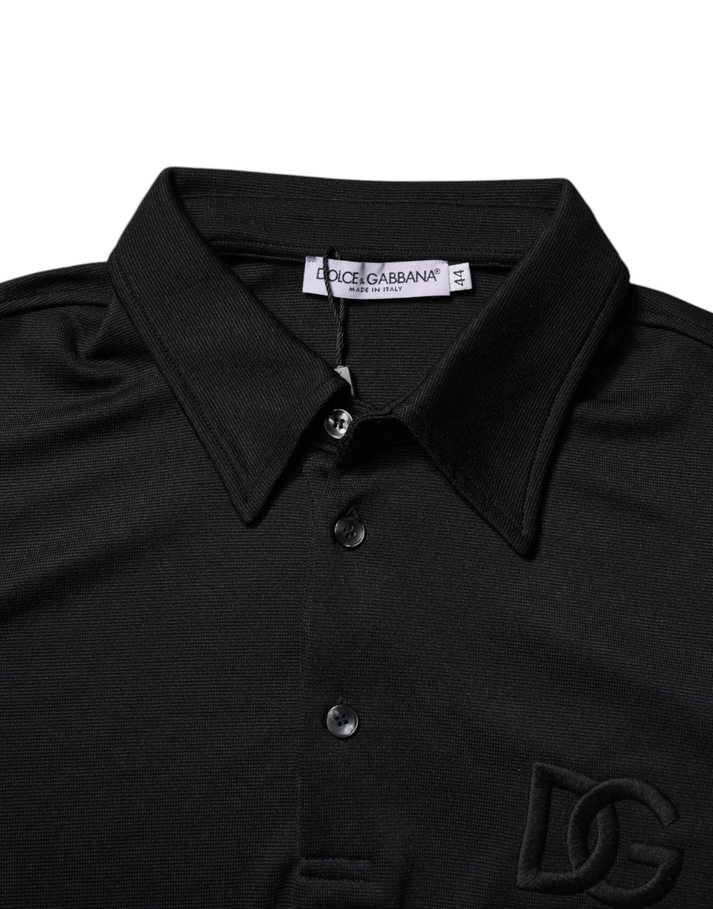 Polo noir en polyester Dolce & Gabbana avec logo DG, col classique, vue de face.