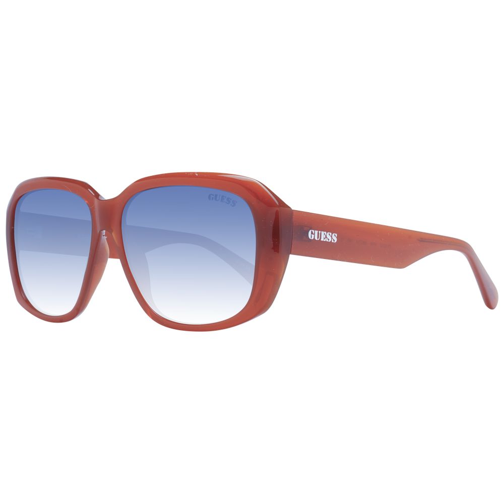 Lunettes de soleil en plastique cuivre de la marque Guess avec monture élégante et lentilles foncées, vue de face.