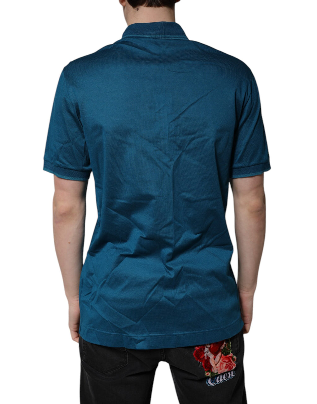 Chemise polo pour homme Dolce & Gabbana en coton bleu avec logo, détails visibles sur l'image.