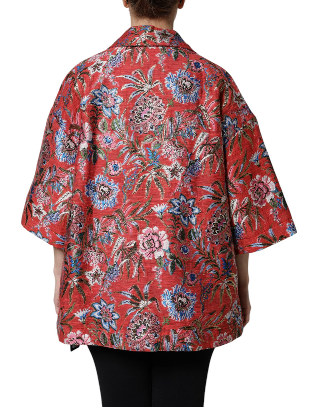 Manteau Dolce & Gabbana en jacquard floral rouge à boutons, veste élégante avec motif floral sophistiqué.