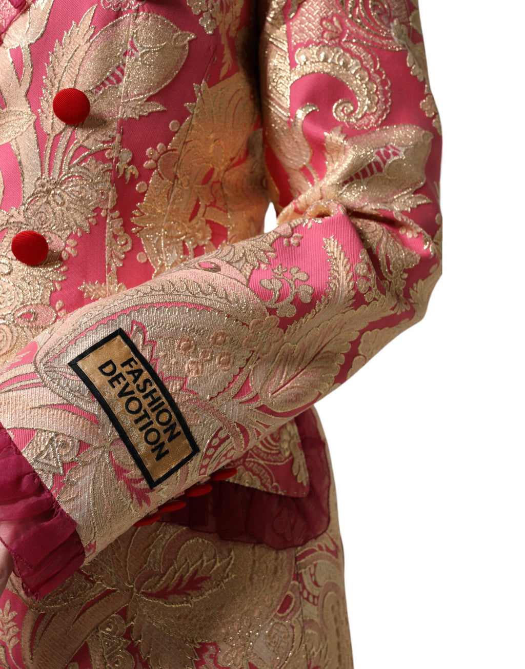Blazer Dolce & Gabbana en jacquard rose et or en nylon, coupe élégante et détails sophistiqués.