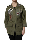 Manteau Dolce & Gabbana vert militaire avec embellissements, coupe Queen, veste élégante et sophistiquée.