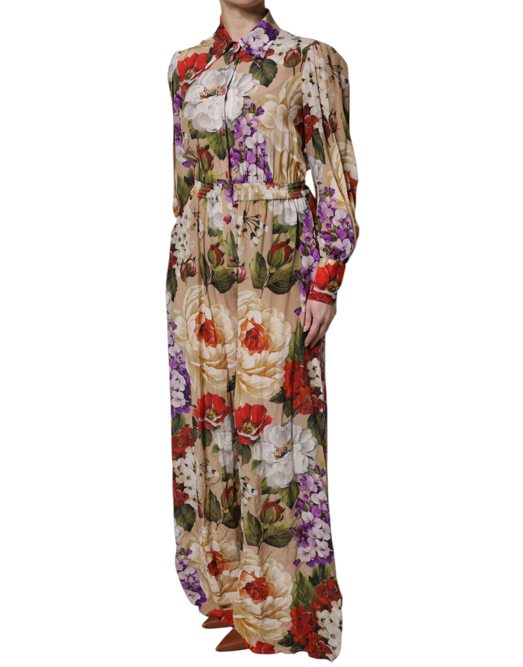 Combinaison pantalon Dolce & Gabbana à fleurs multicolores, coupe large, robe élégante avec motif floral vibrant.