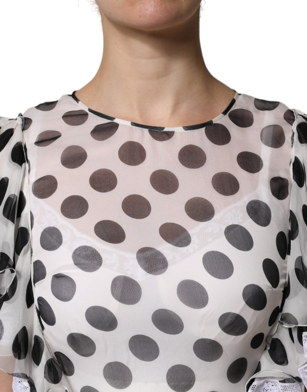 Robe blanche à pois en soie mélangée de Dolce & Gabbana, coupe évasée et élégante, pour un style sophistiqué et féminin.