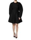 Robe courte en coton noire Dolce & Gabbana à manches longues et coupe en A, élégante et sophistiquée.