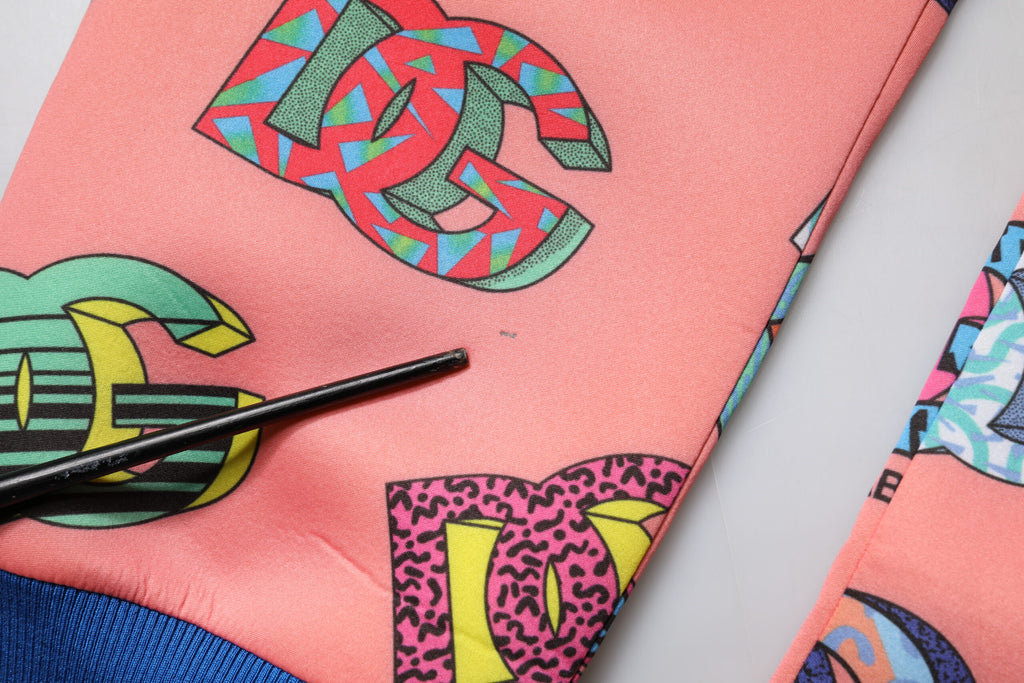 Pantalon de jogging Dolce & Gabbana rose avec logo monogramme, style décontracté en coton.