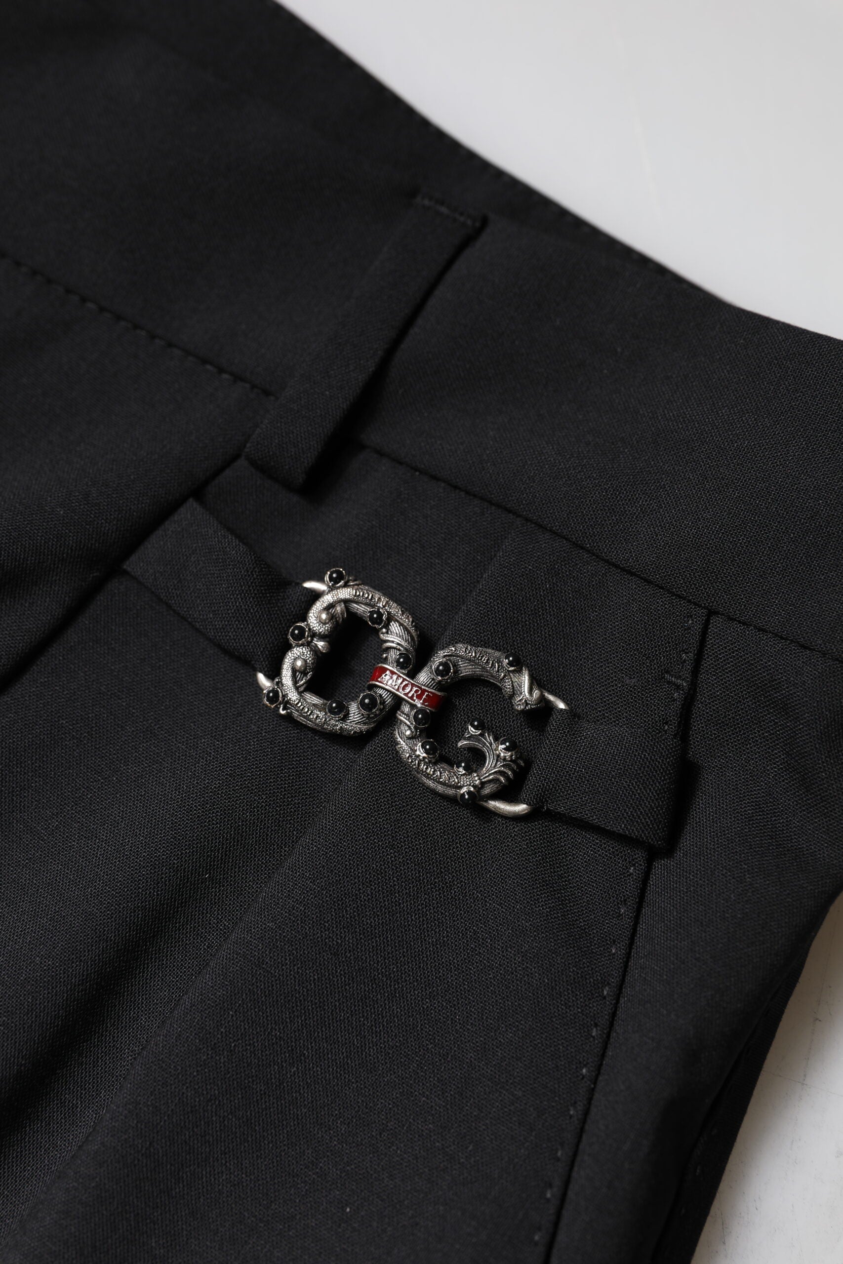 Pantalon de costume noir en polyester à taille haute de Dolce & Gabbana, vue de face.