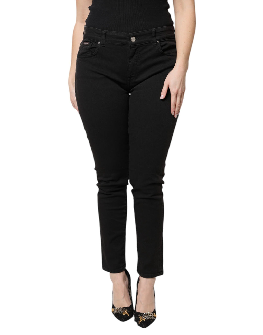 Jeans skinny en denim noir en coton à taille haute de Dolce & Gabbana, montrant la coupe ajustée et le style élégant.