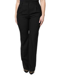 Pantalon noir en laine Dolce & Gabbana à taille haute et coupe boot cut, vue de face sur mannequin.