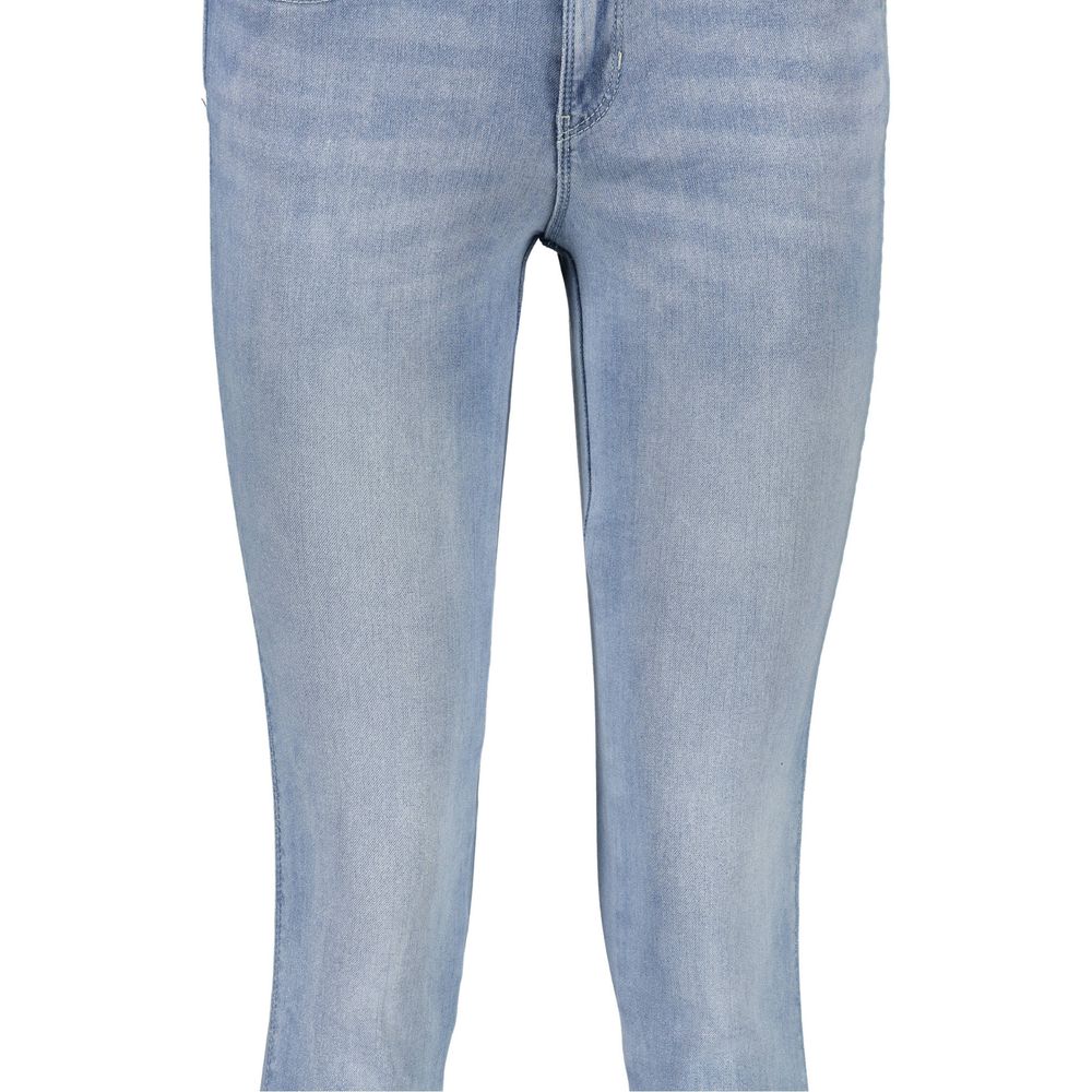 Jeans pour femmes Guess Jeans en coton bleu azur, coupe classique, détails de couture visibles.