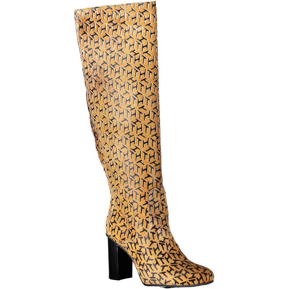 Bottes pour femmes en cuir beige de Tommy Hilfiger, élégantes et confortables, avec semelle en caoutchouc et design tendance.