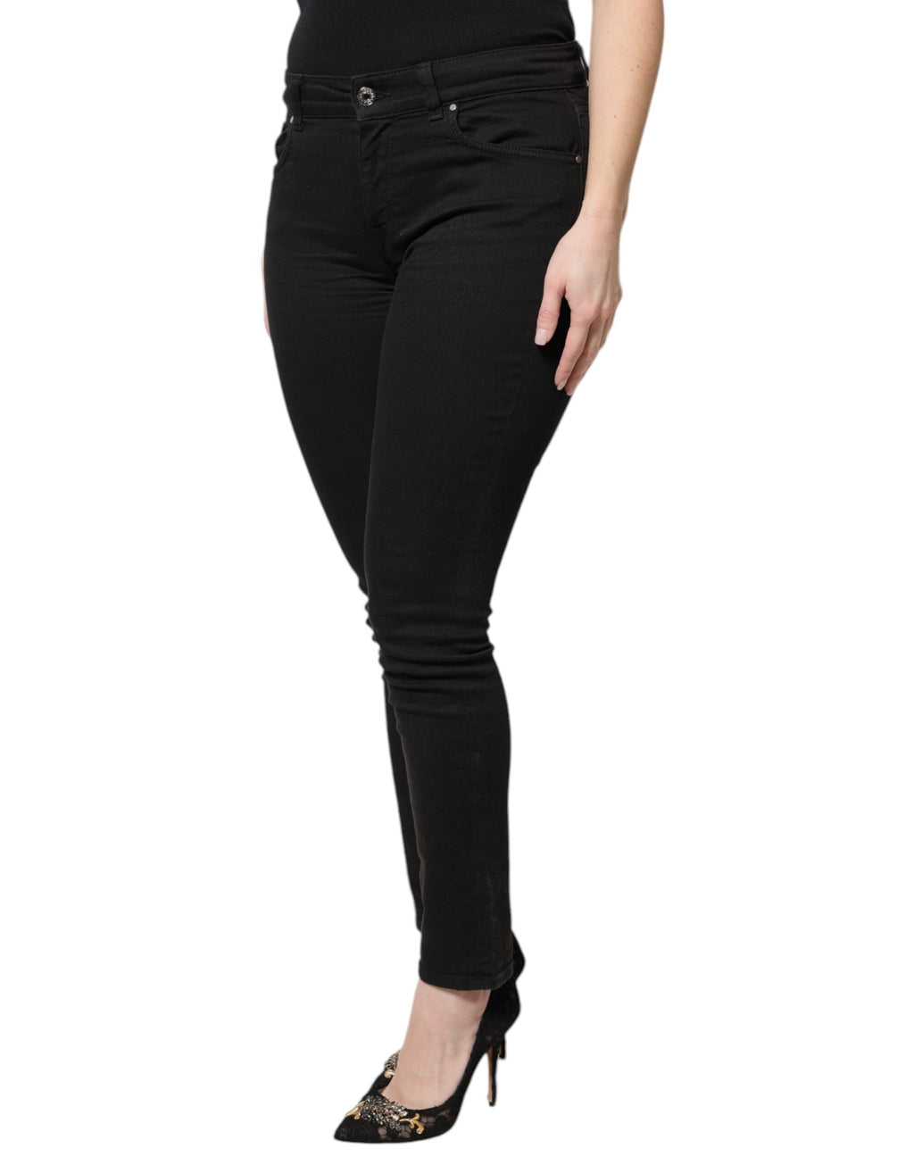 Jeans skinny taille haute en coton noir Dolce & Gabbana, coupe ajustée et élégante, visible sur cette image.