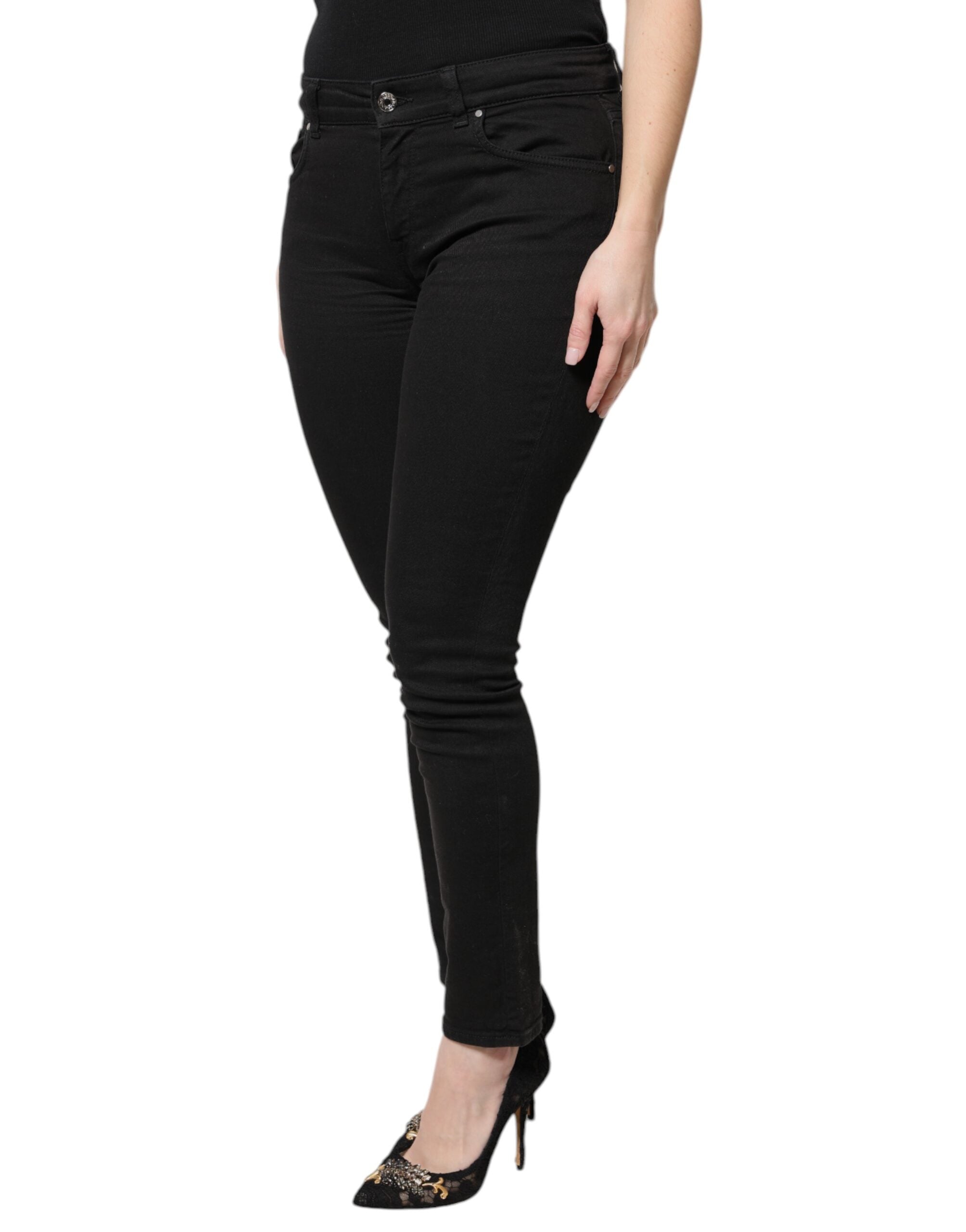 Jeans skinny taille haute en coton noir Dolce & Gabbana, coupe ajustée et élégante, visible sur cette image.