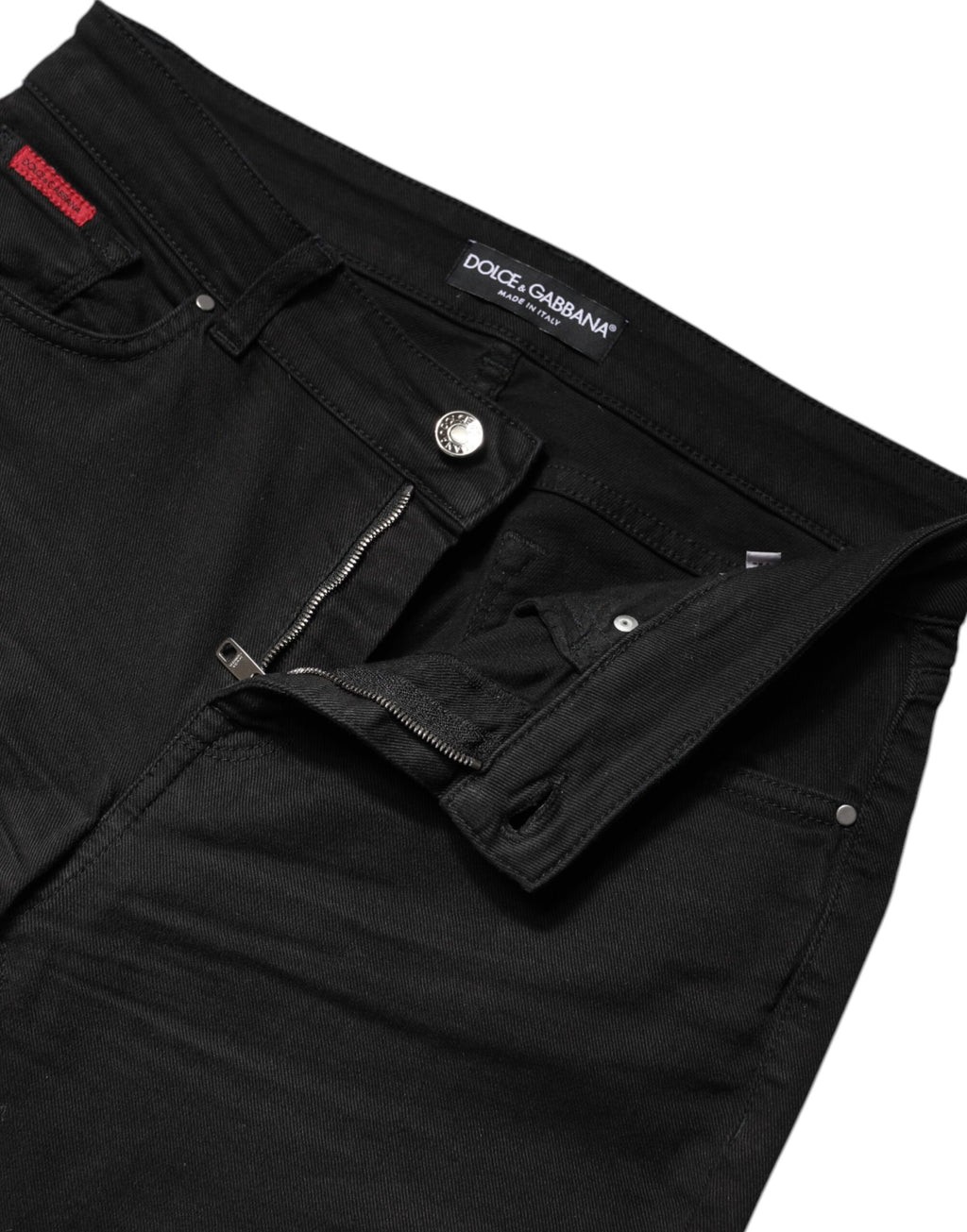 Jeans skinny en coton noir à taille haute de Dolce & Gabbana, coupe ajustée et détails classiques.