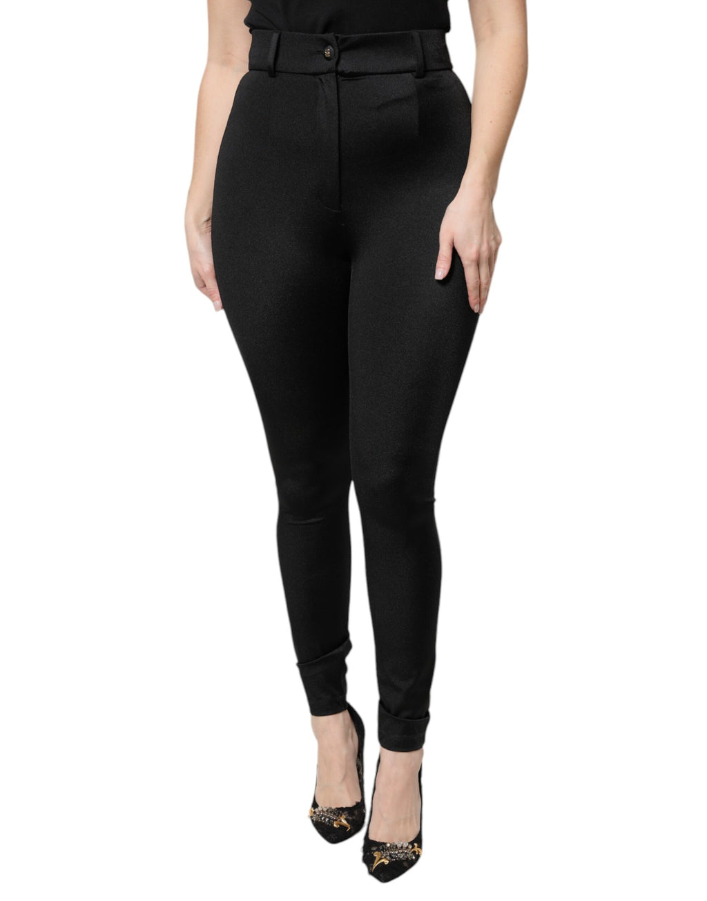 Pantalon noir en nylon à taille haute et coupe slim de Dolce & Gabbana, vue de face.