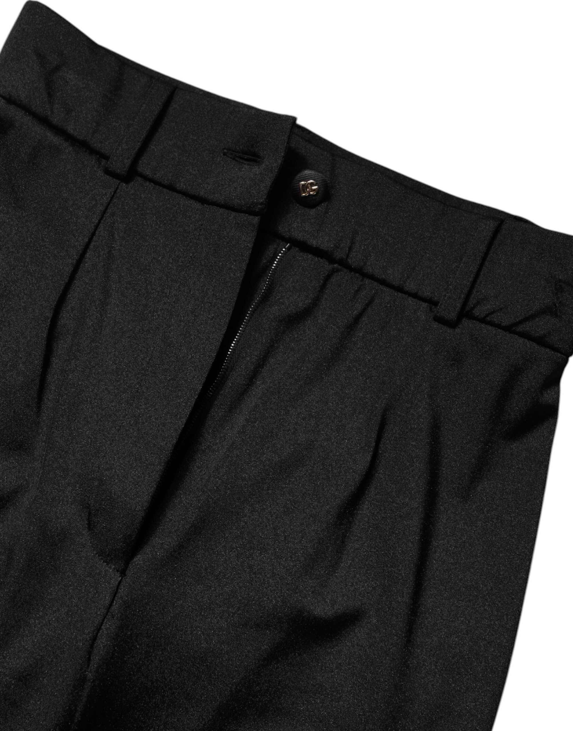 Pantalons noir en nylon Dolce & Gabbana, taille haute, coupe slim, vue de face.